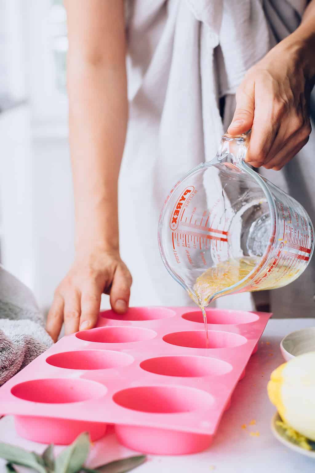 Pouring exfoliating soaps into molds