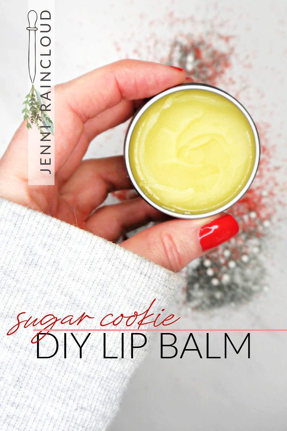 Hand holding a diy lip balm.