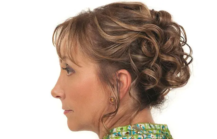 Woman with a messy curly updo