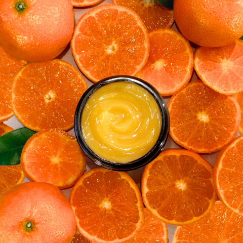 Miracle Face Mask with Oranges in background