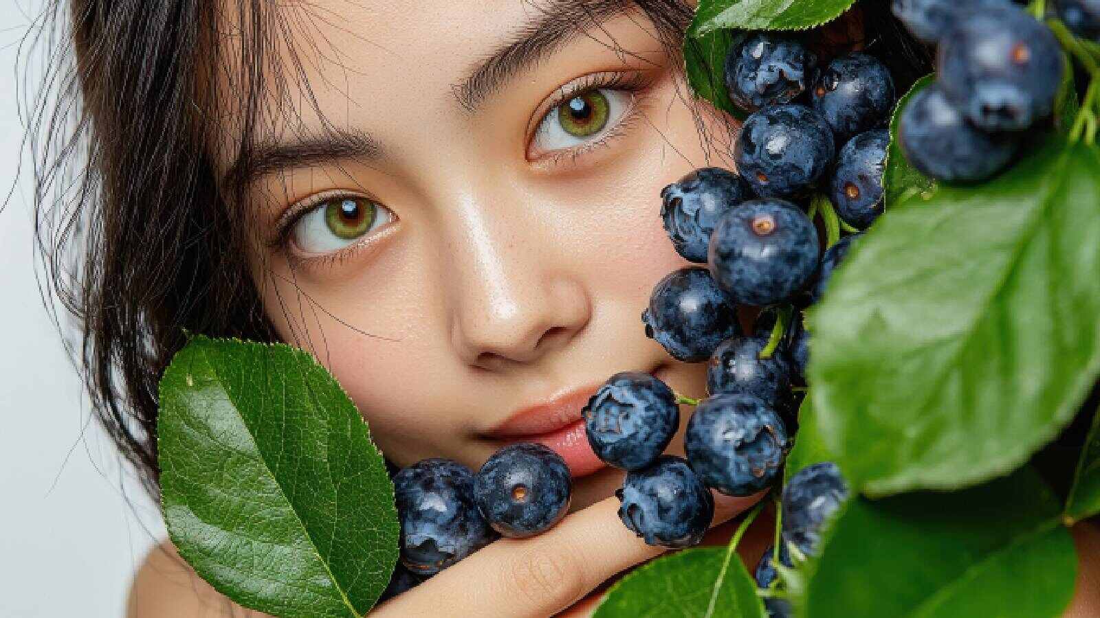 A woman with blueberries