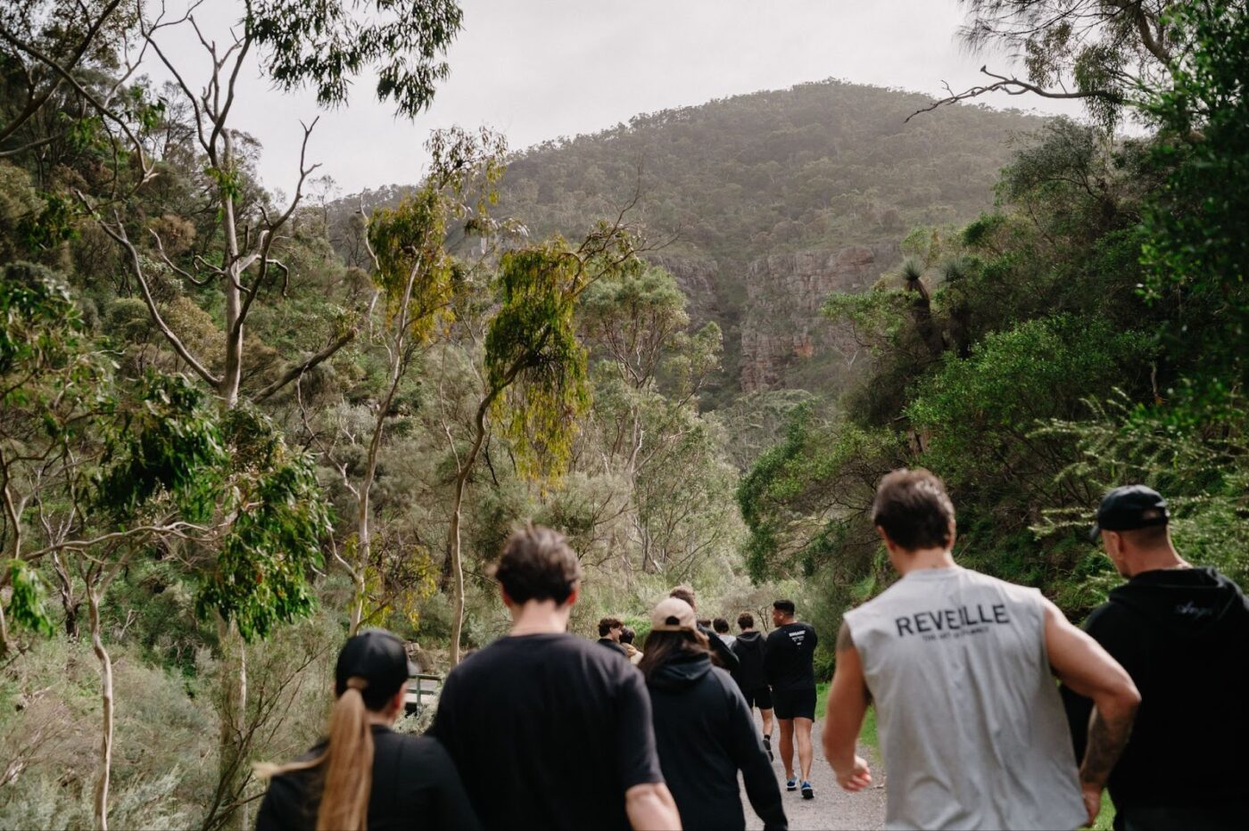 Hikers in activewear amid nature.