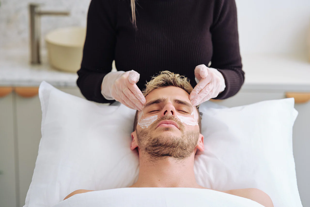 a man getting a chemical peel applied